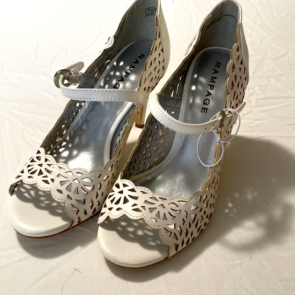Brand new white pumps